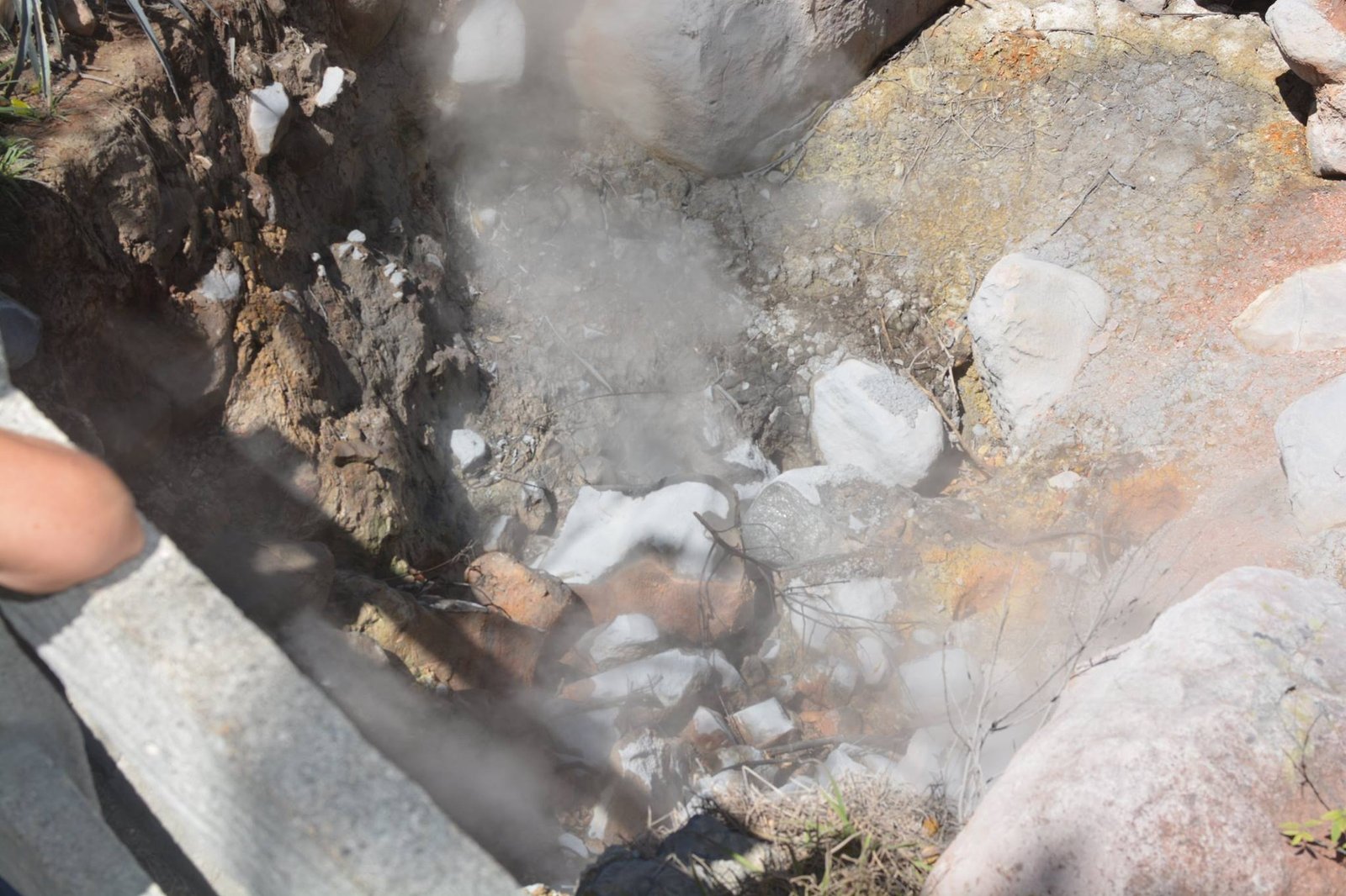 "Hikers exploring the scenic trails of Rincón de la Vieja National Park, surrounded by lush forests and volcanic landscapes, followed by an exciting river tubing adventure."