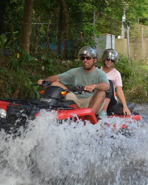 "ATV tour on Tamarindo Beach, Costa Rica, riding through sandy trails, lush jungle paths, and stunning ocean views." 🚜🌴🌊