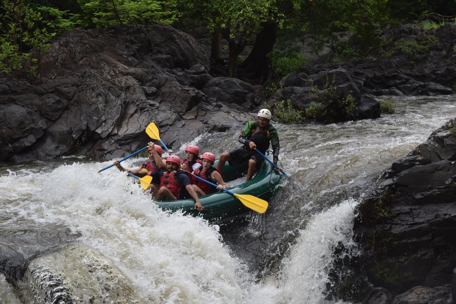 "Thrilling white-water rafting adventure on the Tenorio River in Costa Rica, featuring exciting rapids and stunning tropical scenery."