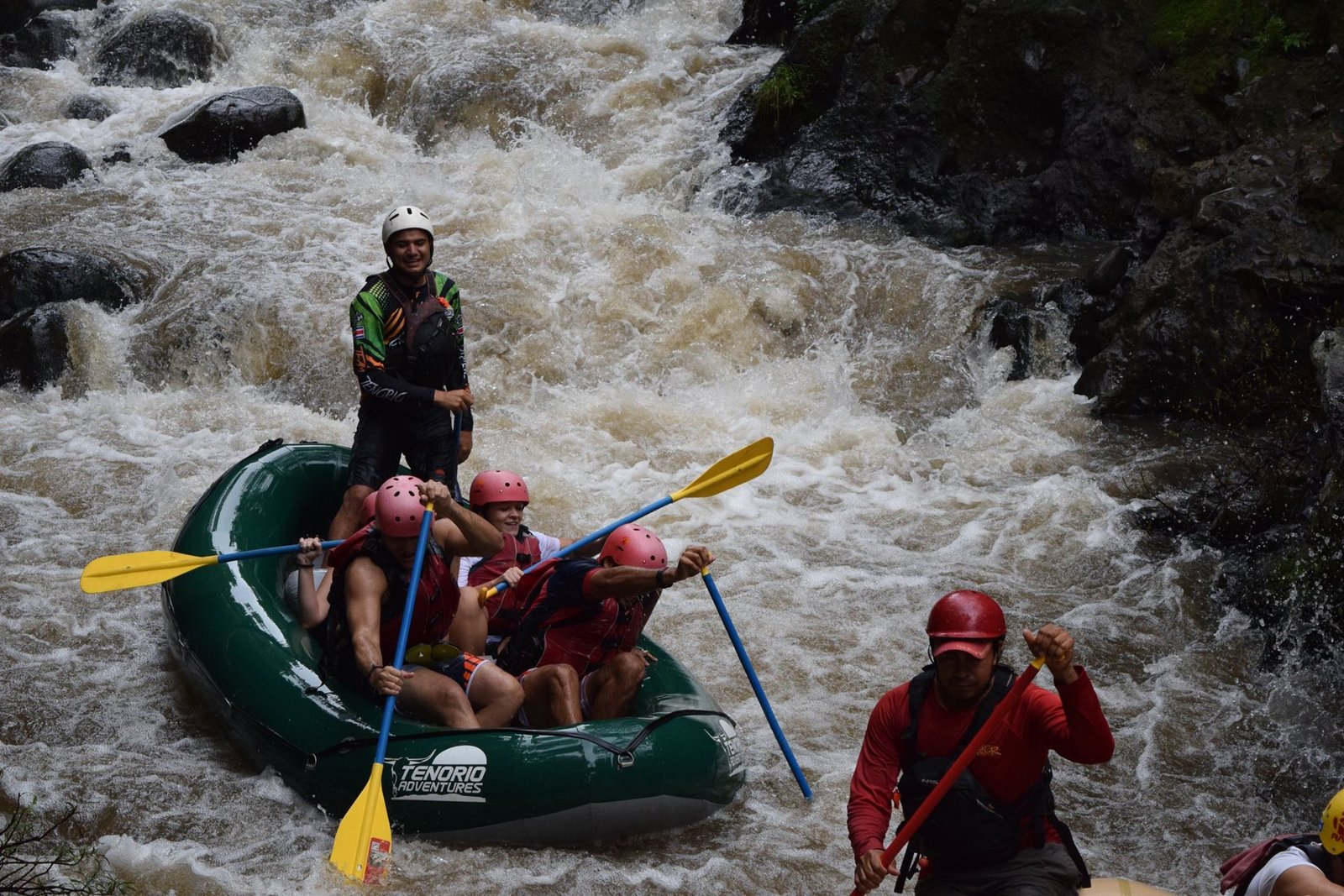 "Thrilling white-water rafting adventure on the Tenorio River in Costa Rica, featuring exciting rapids and stunning tropical scenery."